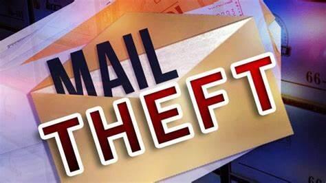 An envelope with the words over it "Mail Theft"