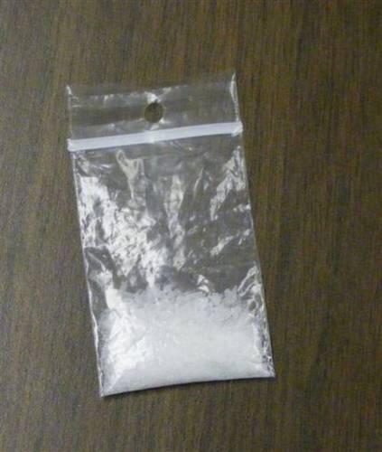 A white substance in a small clear bag.