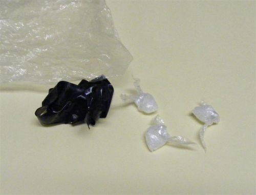 Several small bags filled with an unknown substance.
